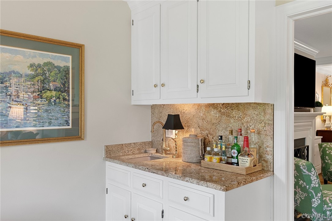 300 North Ridge Road, Unit 70 Henrico, VA 23229 - Photo 25 of 36 a kitchen with stainless steel appliances granite countertop a sink and a white cabinets