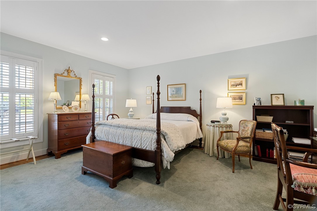 300 North Ridge Road, Unit 70 Henrico, VA 23229 - Photo 32 of 36 a bed room with a bed and a chair