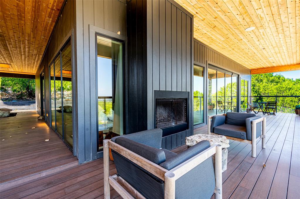 1485 Autumn Valley Bluff Dale, TX 76433 - Photo 12 of 40 Outdoor fireplace with sitting area