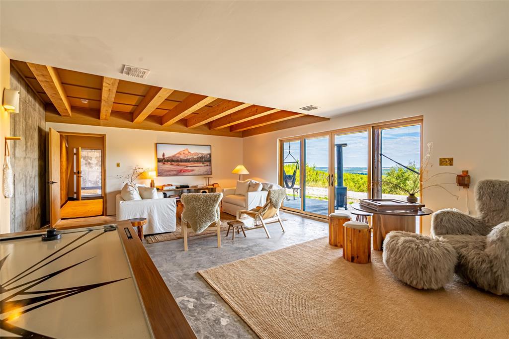 1485 Autumn Valley Bluff Dale, TX 76433 - Photo 40 of 40 Garage level game room with bathroom.