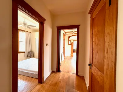 a view of a bedroom from a hallway