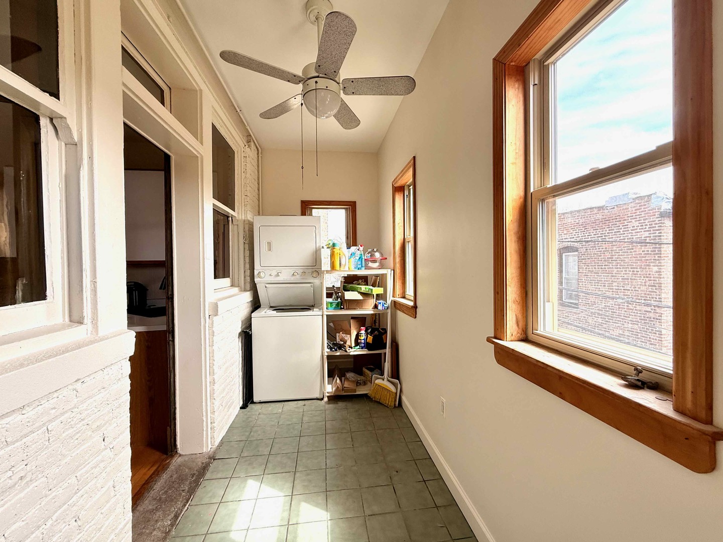 2414 North Spaulding Avenue, Unit 2F Chicago, IL 60647 - Photo 25 of 30 a view of a hallway with workspace and a window
