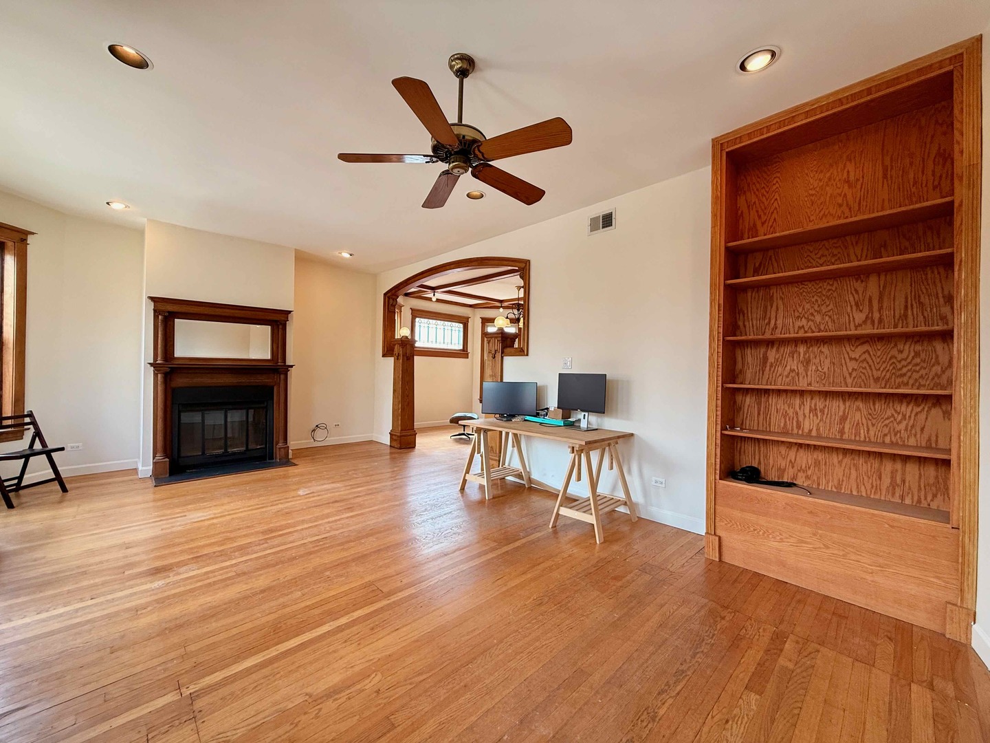 2414 North Spaulding Avenue, Unit 2F Chicago, IL 60647 - Photo 5 of 30 a living room with furniture and a fireplace