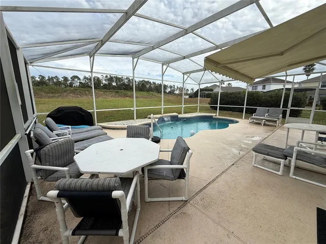 a view of a lake and yard with green space