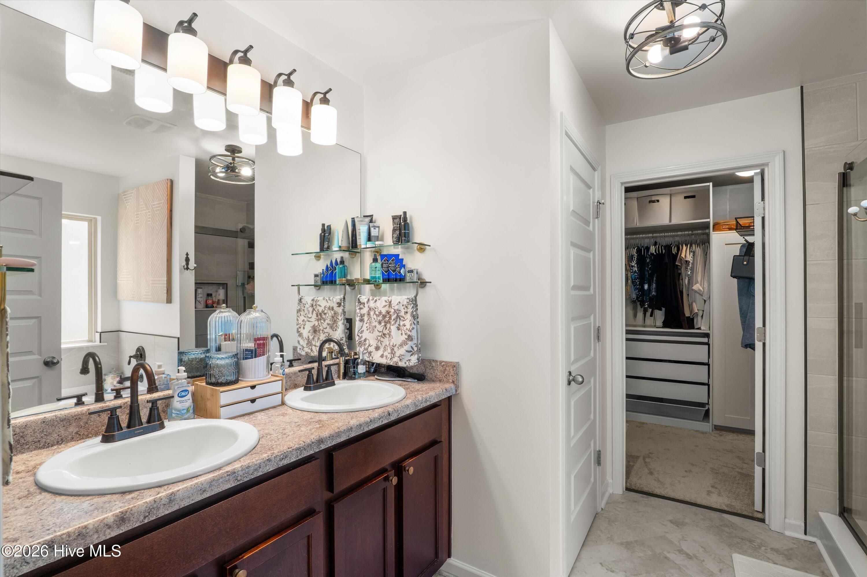 136 Sims Court Augusta, GA 30909 - Photo 23 of 35 Master bath with double vanity, soaking tub and tiled shower