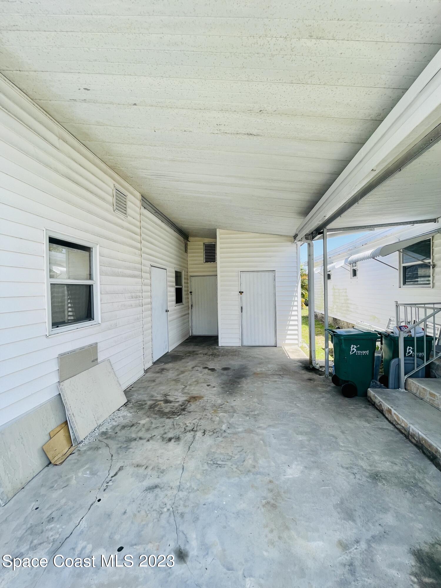 706 Barefoot Boulevard Barefoot Bay, FL 32976 - Photo 5 of 14 a view of a livingroom with furniture