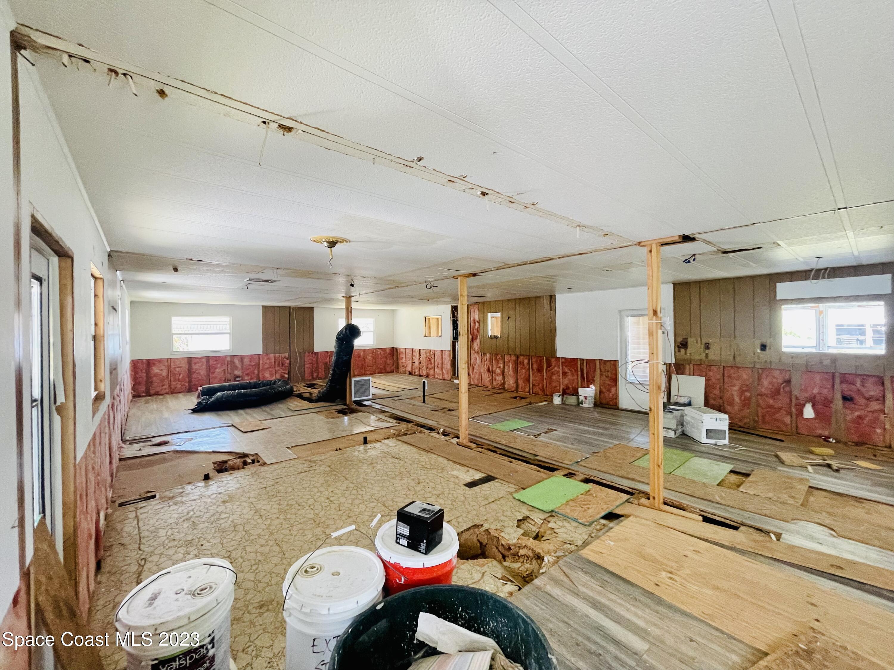706 Barefoot Boulevard Barefoot Bay, FL 32976 - Photo 7 of 14 a very nice looking room with a large window