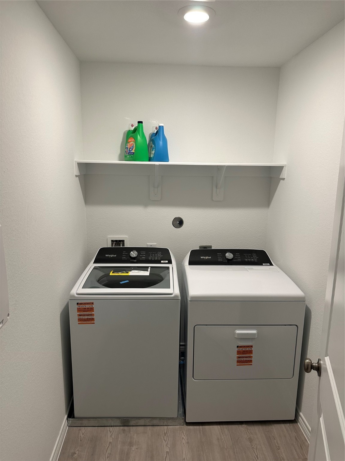 15214 Canyon Rapids Road Conroe, TX 77302 - Photo 17 of 22 a utility room with dryer and washer