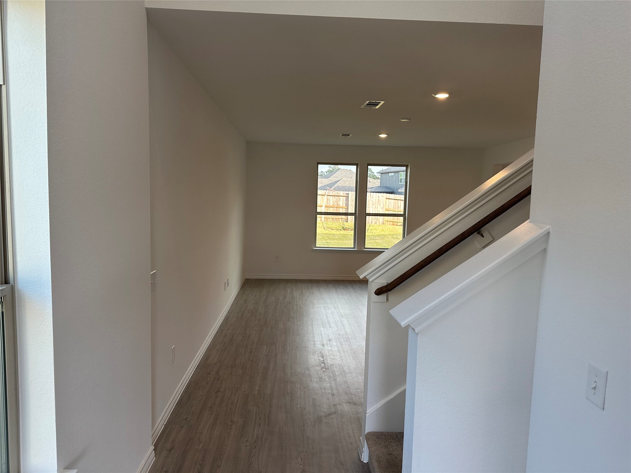 15214 Canyon Rapids Road Conroe, TX 77302 - Photo 2 of 22 a view of an empty room with a window