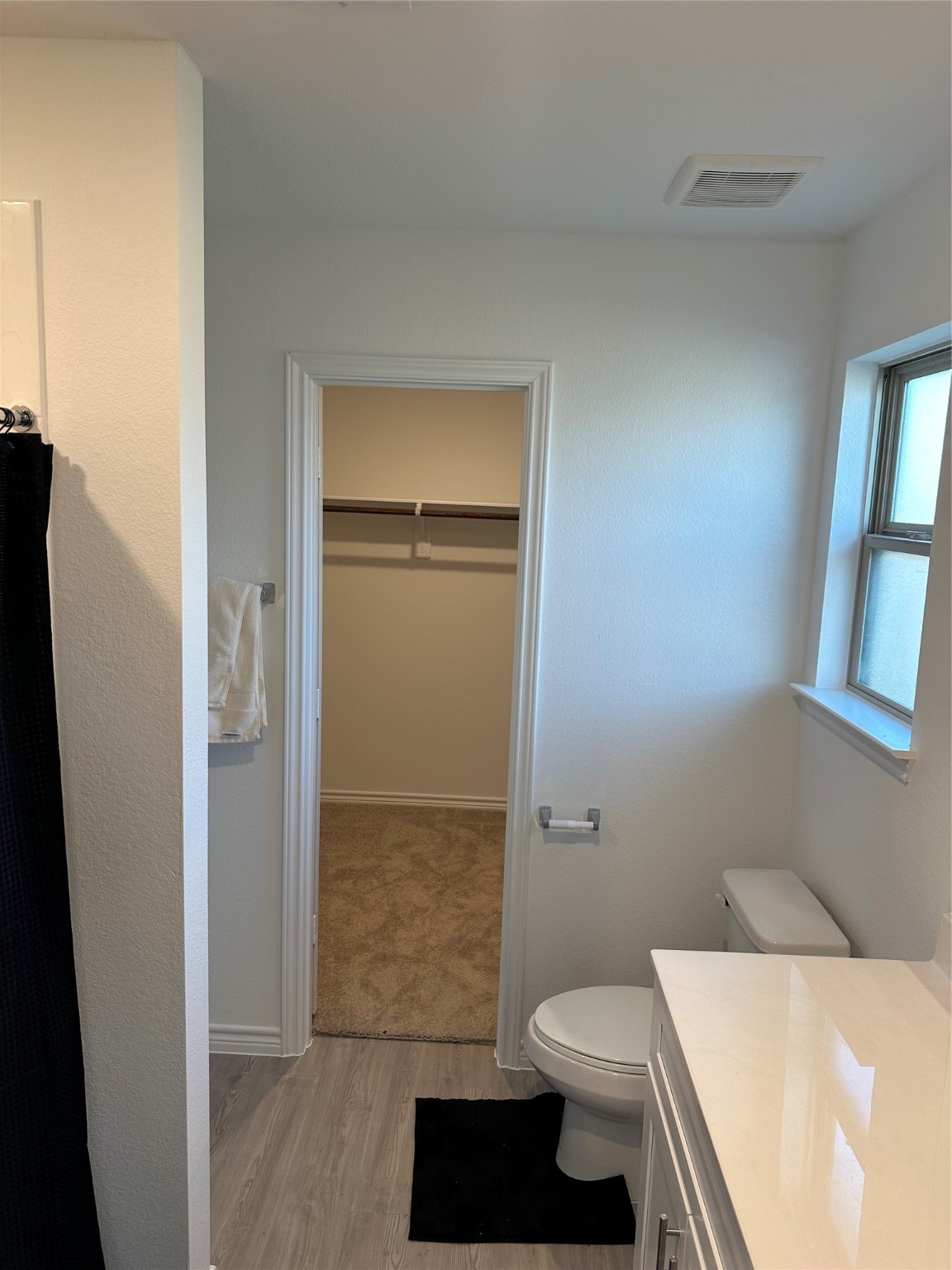 15214 Canyon Rapids Road Conroe, TX 77302 - Photo 10 of 22 a bathroom with a toilet and a shower