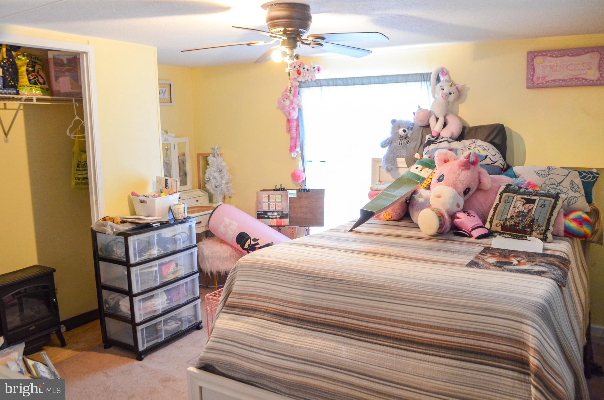 2001 Red Bank Road Dover, PA 17315 - Photo 12 of 19 a bedroom with two beds and a chandelier