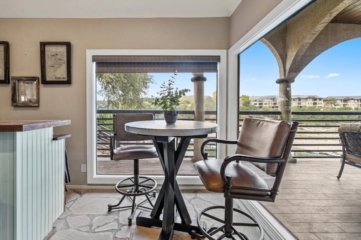 925 Challenger Lakeway, TX 78734 - Photo 17 of 40 a view of a dining room with furniture window and outside view