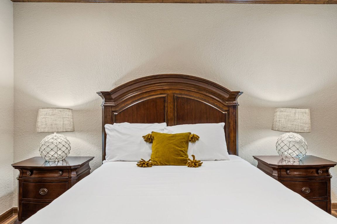 925 Challenger Lakeway, TX 78734 - Photo 25 of 40 a bedroom with a bed and a closet