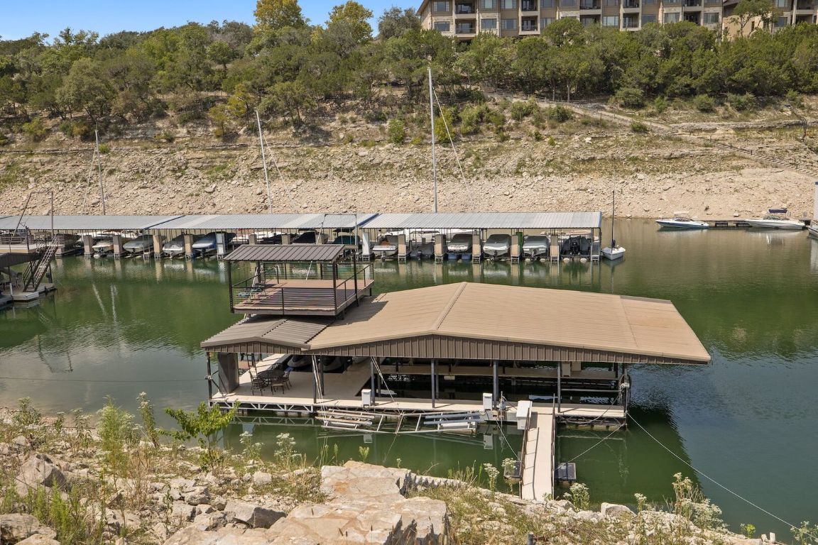 925 Challenger Lakeway, TX 78734 - Photo 3 of 40 a view of a lake with a mountain view