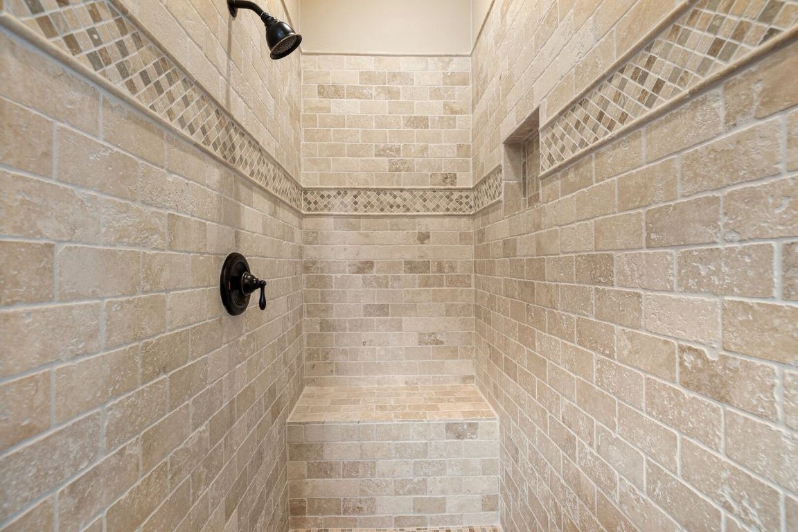 925 Challenger Lakeway, TX 78734 - Photo 33 of 40 a bathroom with a shower