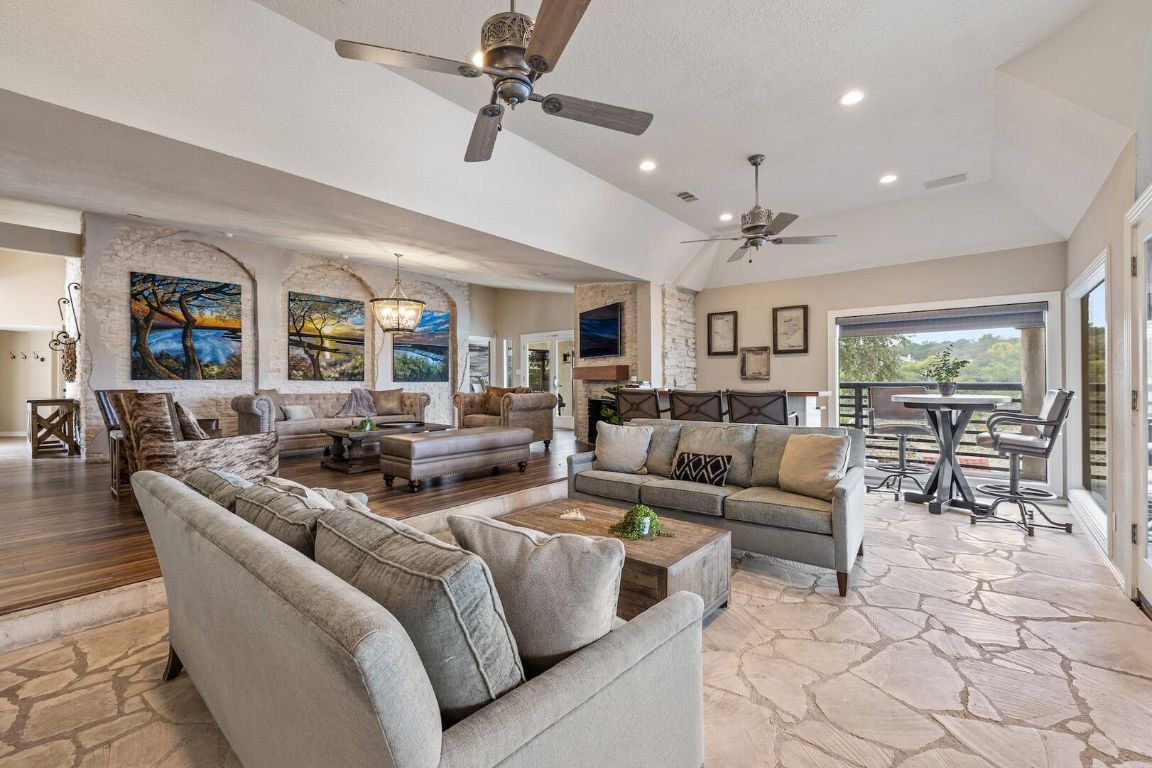 925 Challenger Lakeway, TX 78734 - Photo 7 of 40 a living room with furniture and a large window