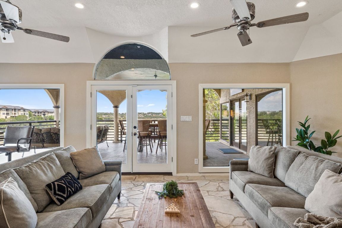 925 Challenger Lakeway, TX 78734 - Photo 8 of 40 a living room with furniture and a large window