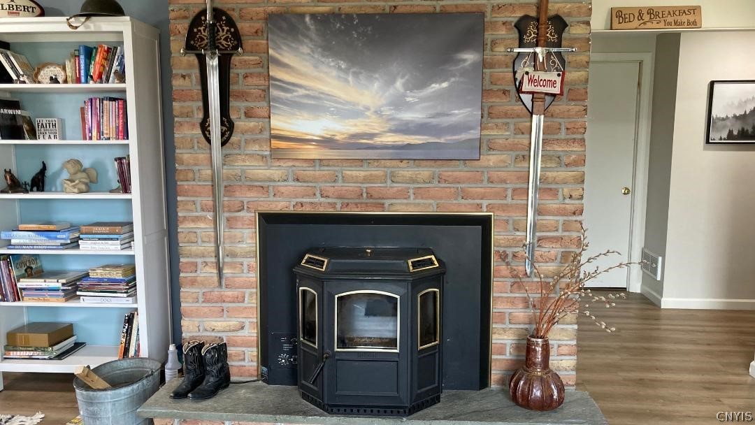 2886 West Lake Road Skaneateles, NY 13152 - Photo 28 of 46 A pellet stove provides additional heat.