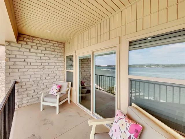 a balcony with an outdoor space