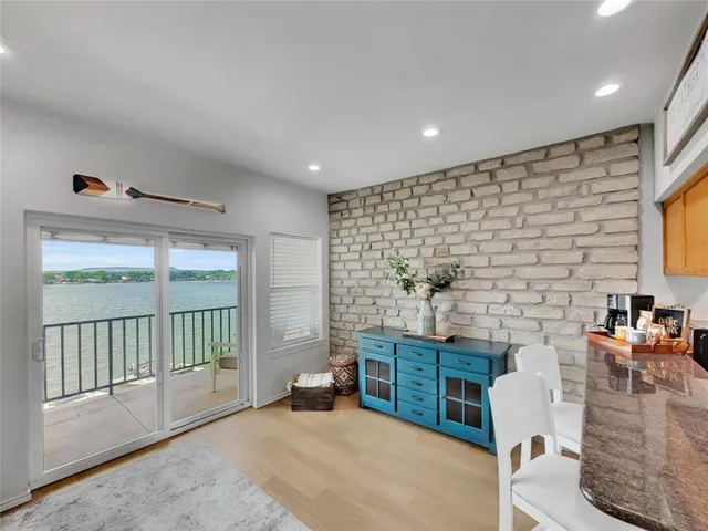 a livingroom with furniture and a flat screen tv