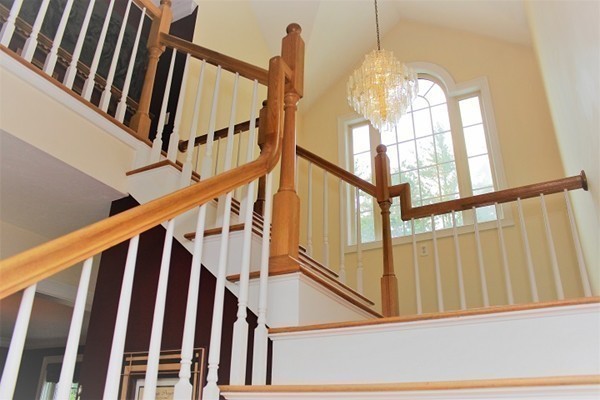 301 Union Street Hanover, MA 02339 - Photo 17 of 30 a view of staircase with railing and a window