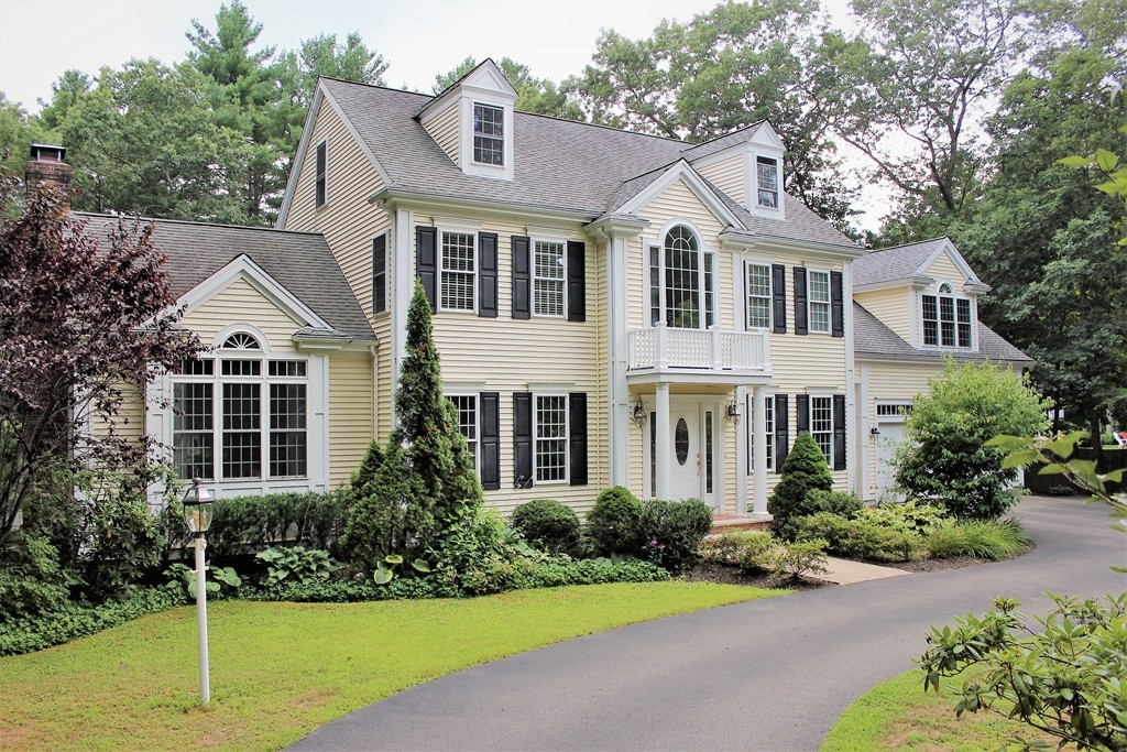 301 Union Street Hanover, MA 02339 - Photo 2 of 30 a front view of a house with a yard
