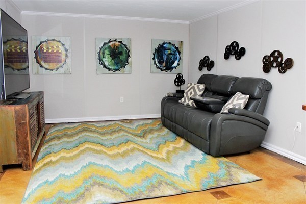 301 Union Street Hanover, MA 02339 - Photo 25 of 30 a living room with rug couches cushion and a window