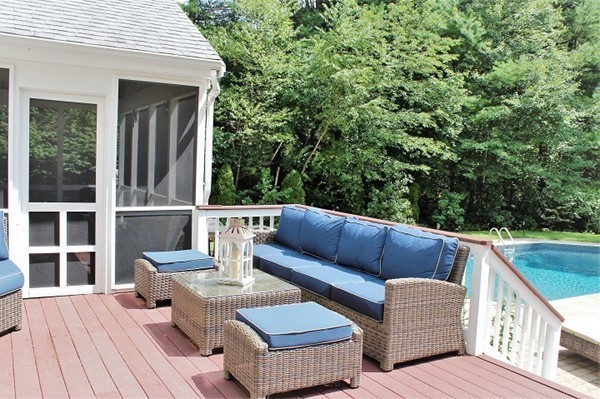 301 Union Street Hanover, MA 02339 - Photo 4 of 30 a roof deck with couches and wooden floor