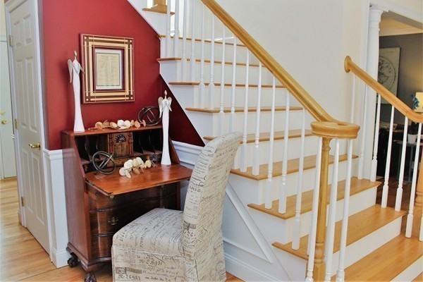 301 Union Street Hanover, MA 02339 - Photo 9 of 30 a balcony view with furniture and wooden floor