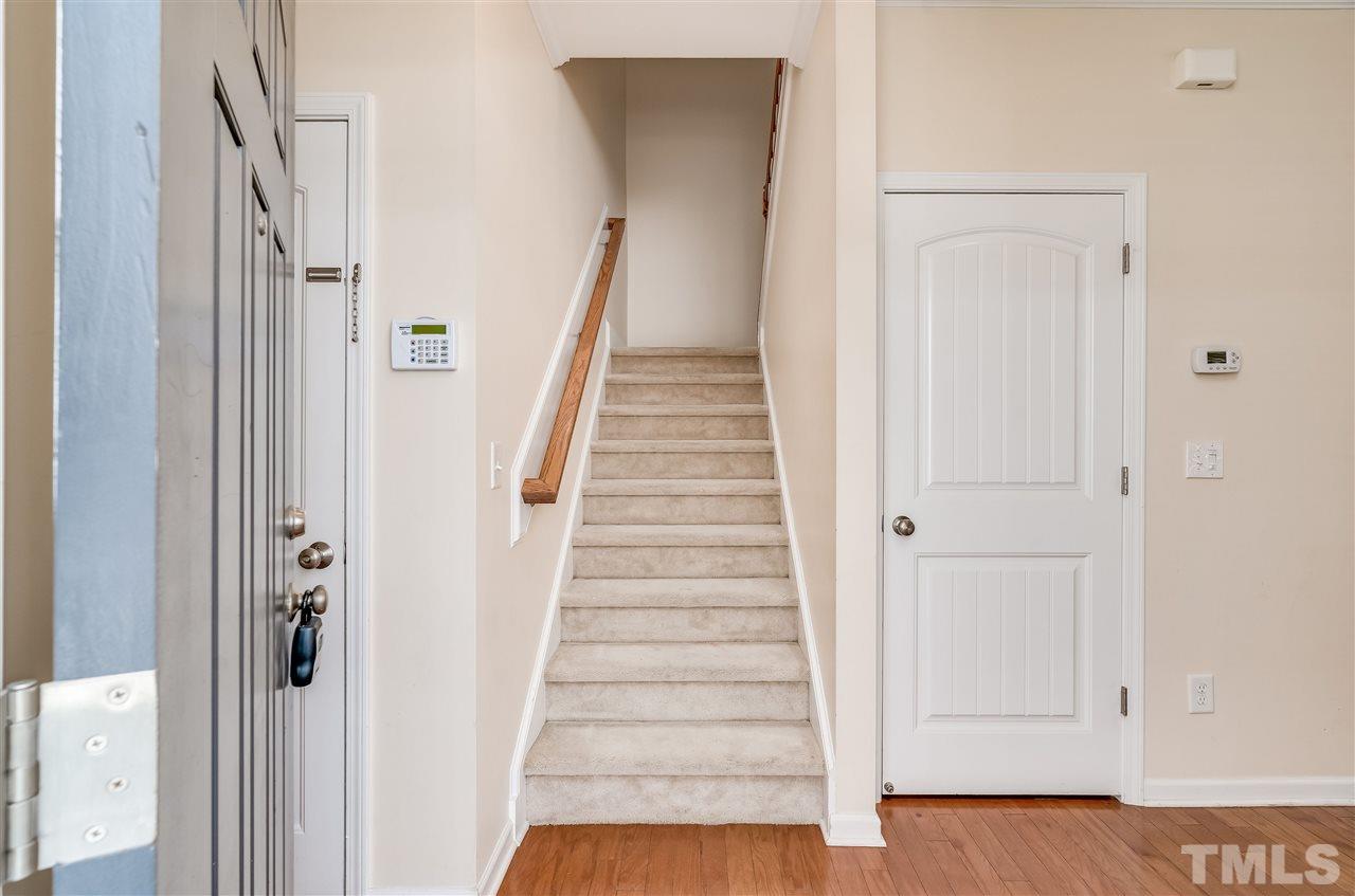 2443 Memory Ridge Drive Raleigh, NC 27606 - Photo 8 of 28 a view of an entryway with wooden floor