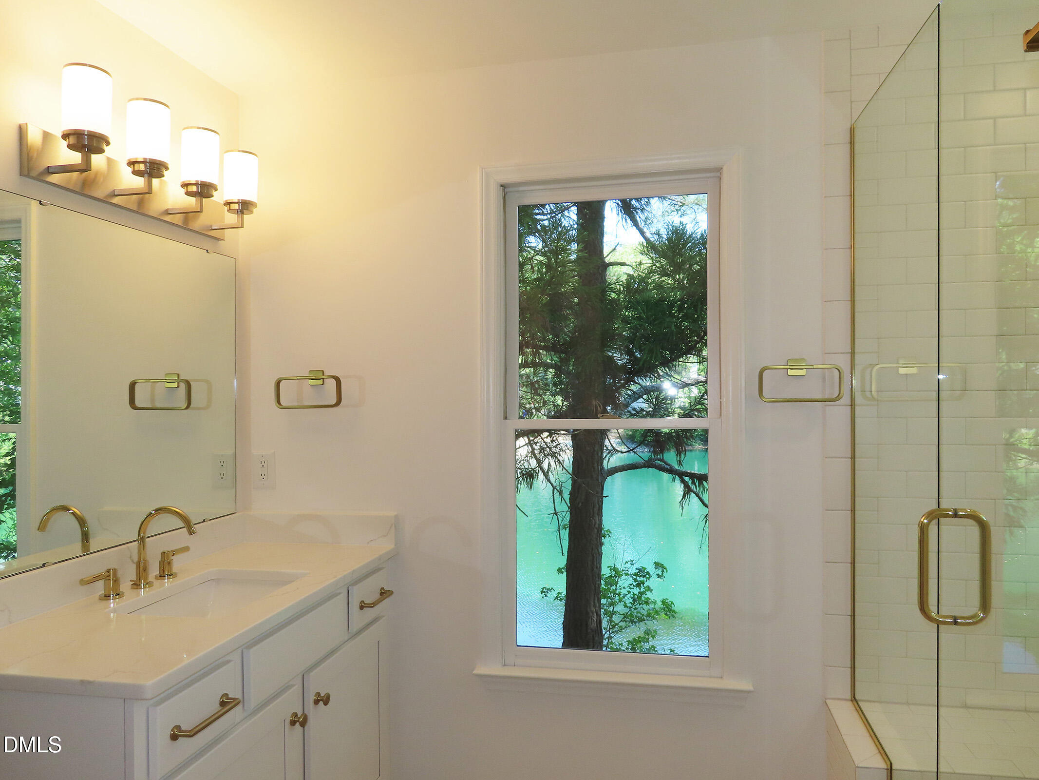120 Weatherhill Point Carrboro, NC 27510 - Photo 9 of 25 a bathroom with a granite countertop sink mirror and window