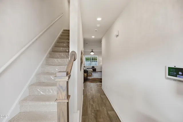 a view of a hallway with a white walls