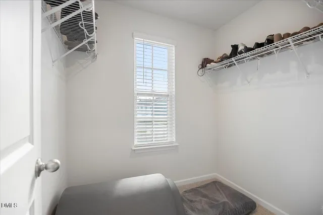 a bathroom with a sink vanity and a mirror