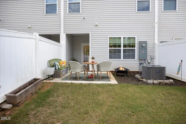 a outdoor living space with furniture and city view