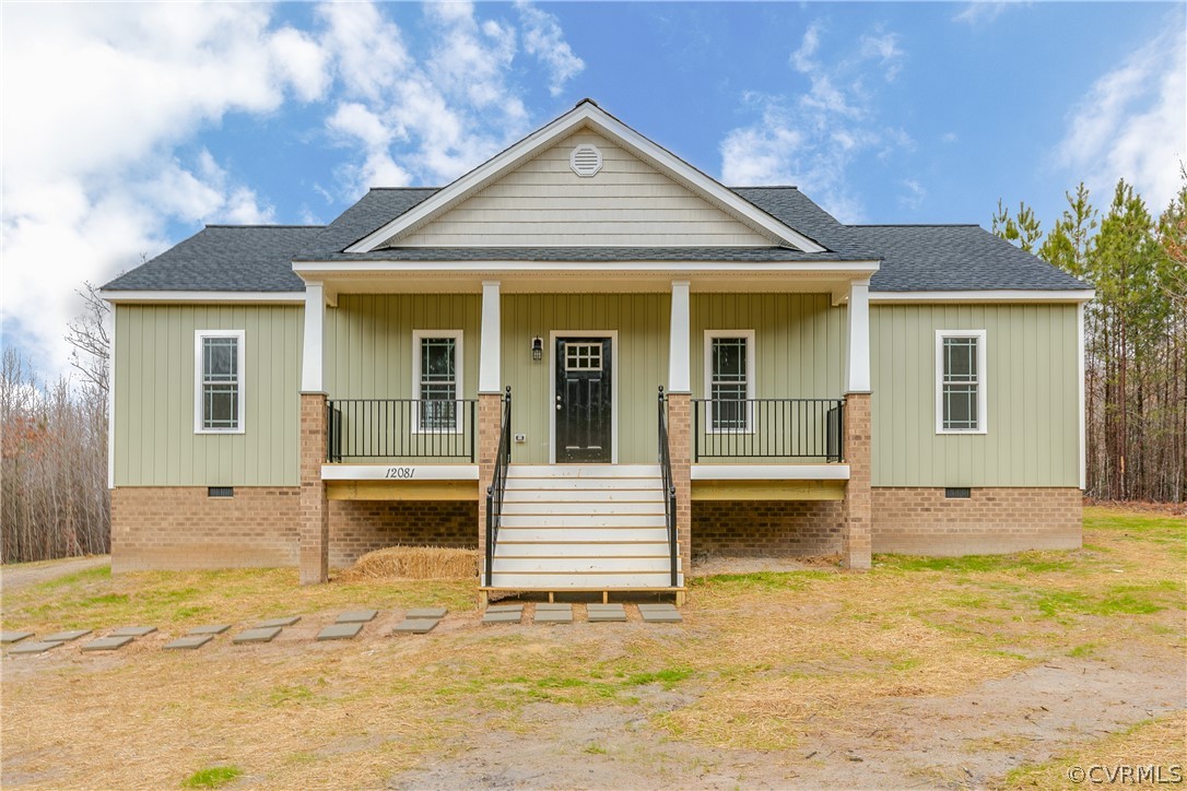 17715 Tyler Station Road Beaverdam, VA 23015 - Photo 1 of 18 a view of a house with a backyard and balcony