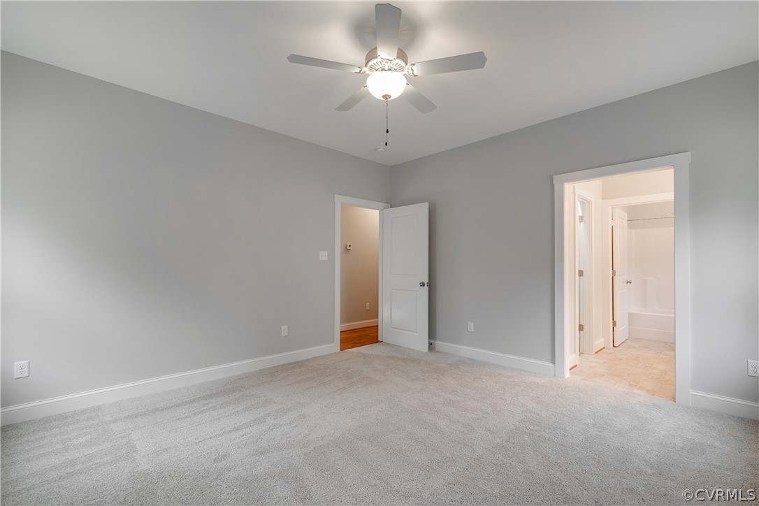 17715 Tyler Station Road Beaverdam, VA 23015 - Photo 12 of 18 a view of an empty room and chandelier fan