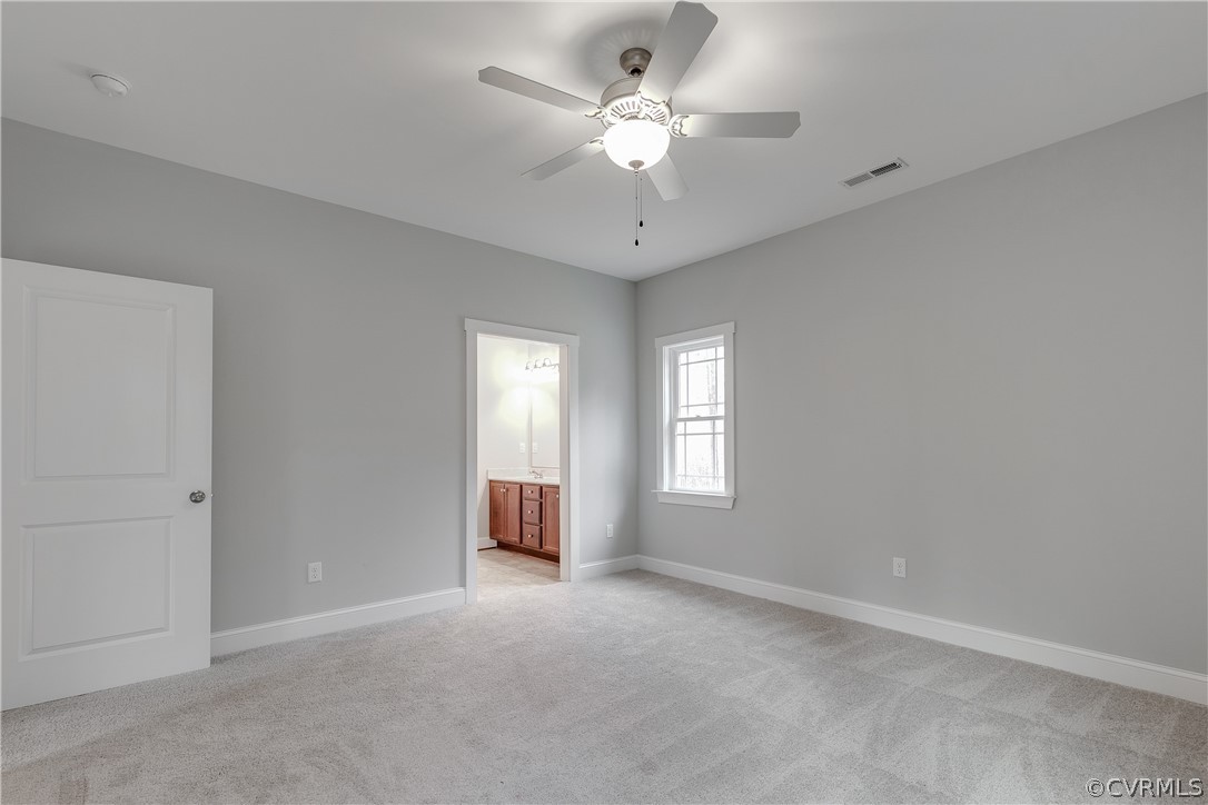 17715 Tyler Station Road Beaverdam, VA 23015 - Photo 13 of 18 a view of an empty room with a window