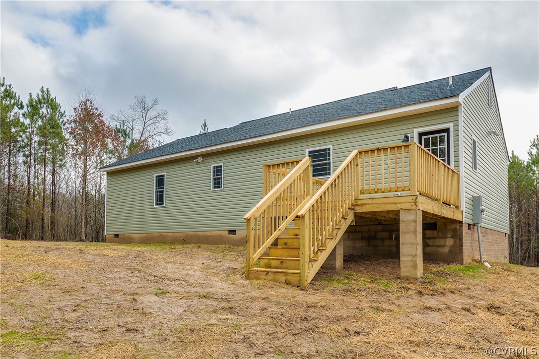 17715 Tyler Station Road Beaverdam, VA 23015 - Photo 18 of 18 a view of a house with wooden fence