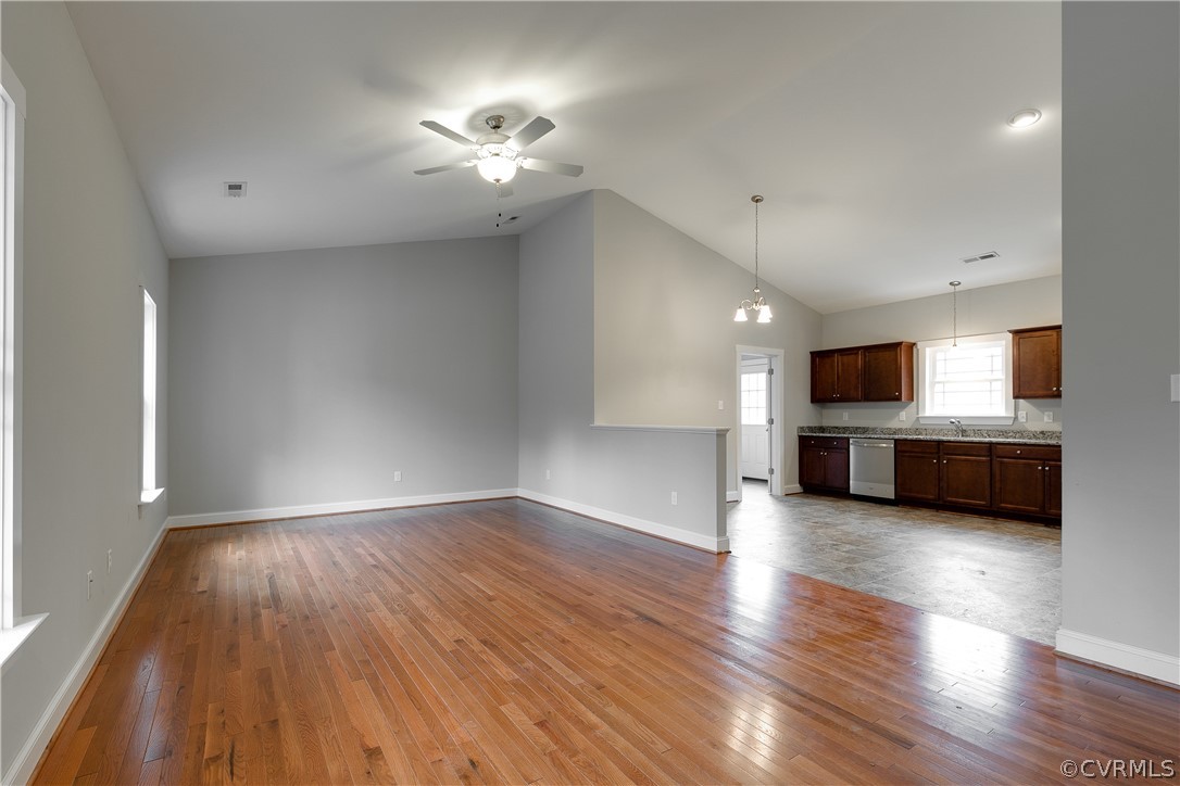 17715 Tyler Station Road Beaverdam, VA 23015 - Photo 2 of 18 a view of a kitchen with a sink cabinets and wooden floor