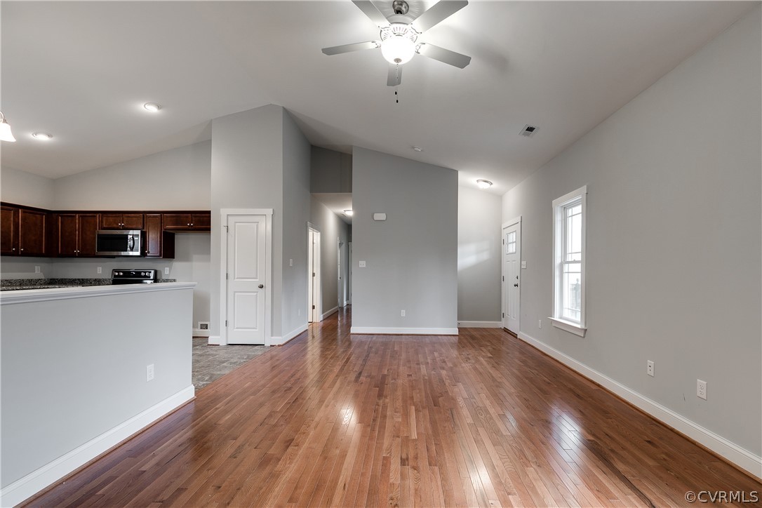 17715 Tyler Station Road Beaverdam, VA 23015 - Photo 4 of 18 a view of a kitchen with a dishwasher cabinets and wooden floor