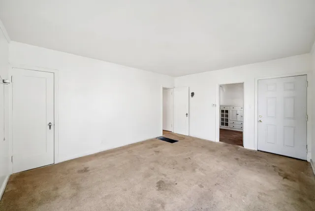a kitchen with a sink stove and refrigerator