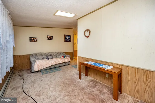 a bedroom with a bed and a cabinets