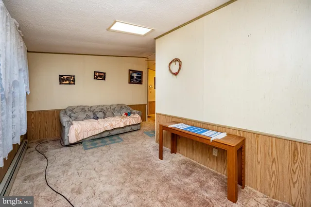 a bedroom with a bed and a cabinets