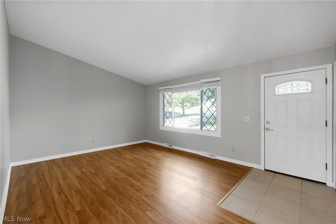 6720 Brookside Road Independence, OH 44131 - Photo 2 of 38 Ceramic tile off the front entry into the living room.