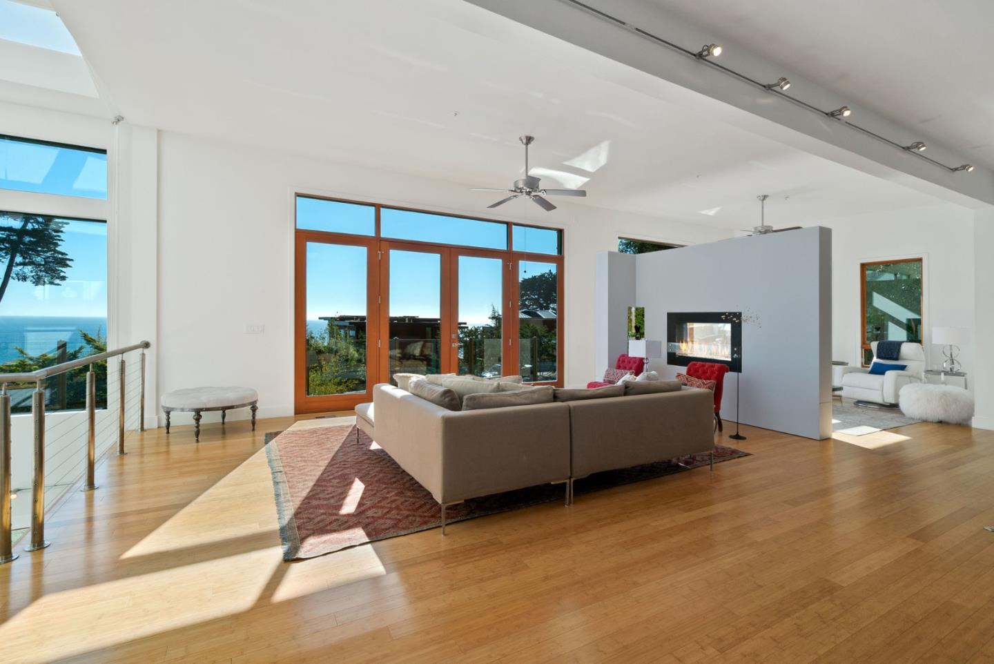 116 New Brighton Road Aptos, CA 95003 - Photo 15 of 50 a living room with furniture and a large window