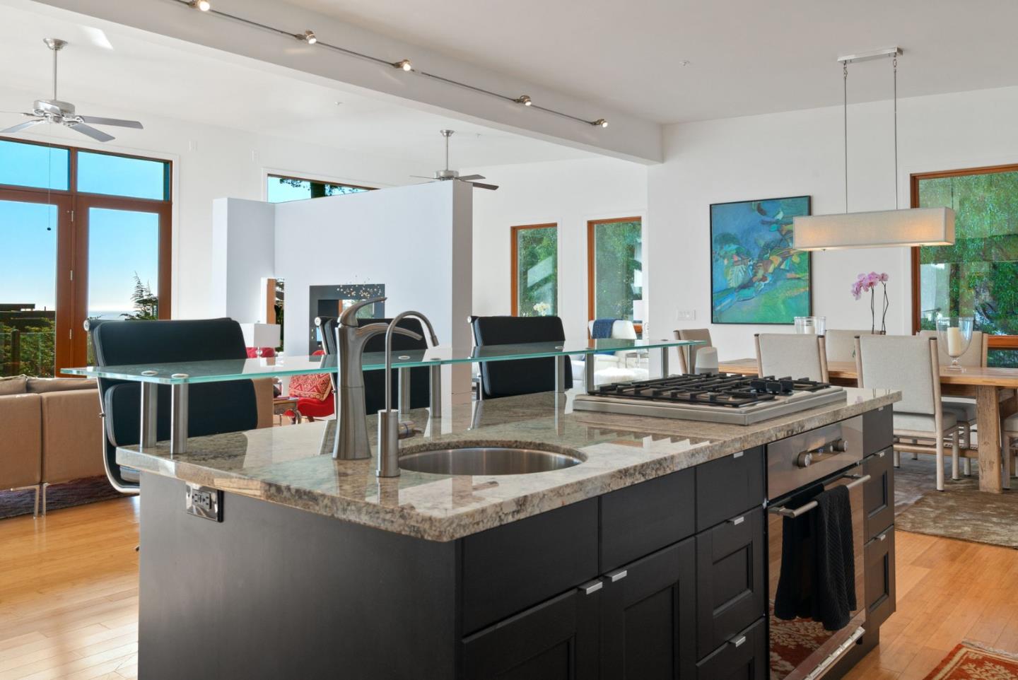 116 New Brighton Road Aptos, CA 95003 - Photo 40 of 50 a kitchen with kitchen island granite countertop a stove and a sink
