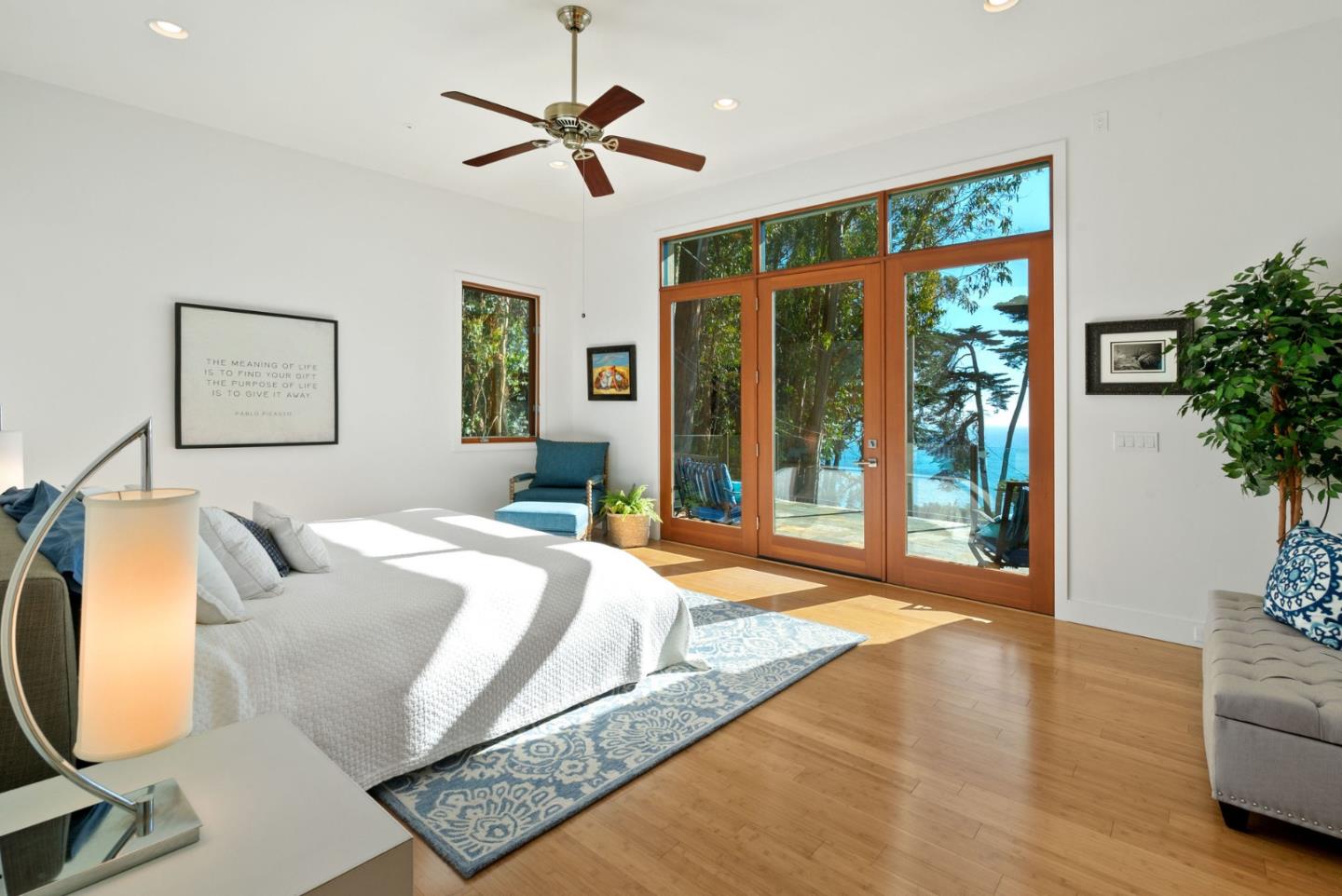 116 New Brighton Road Aptos, CA 95003 - Photo 43 of 50 a spacious bedroom with a large bed and a large window