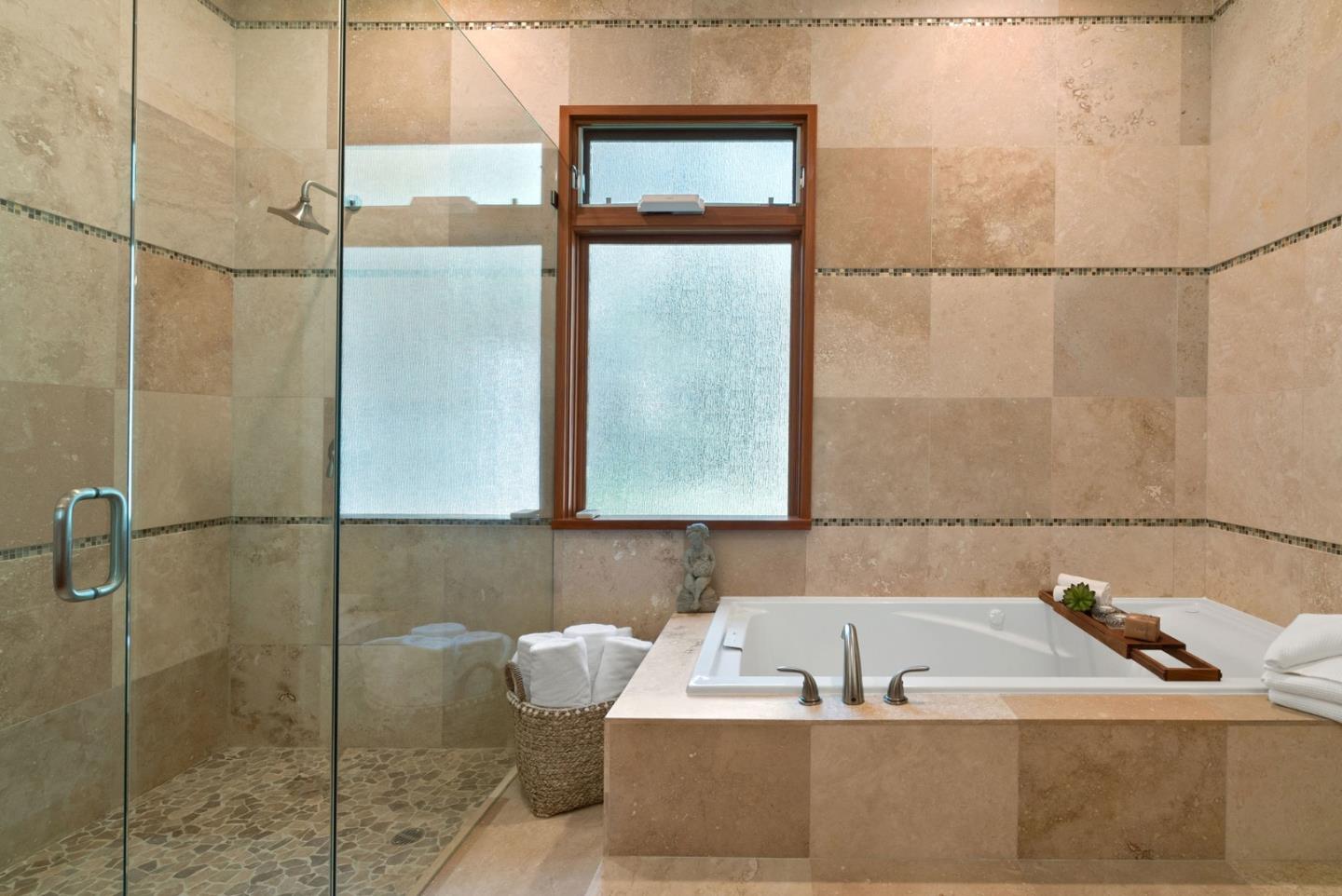 116 New Brighton Road Aptos, CA 95003 - Photo 50 of 50 a bathroom with a bathtub and shower