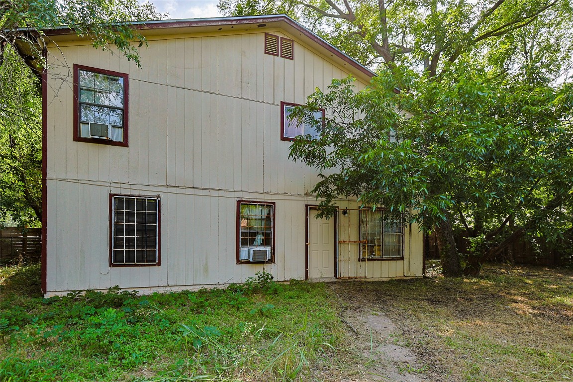 6110 Calmar Cove Austin, TX 78721 - Photo 11 of 26 a house with trees in front of it