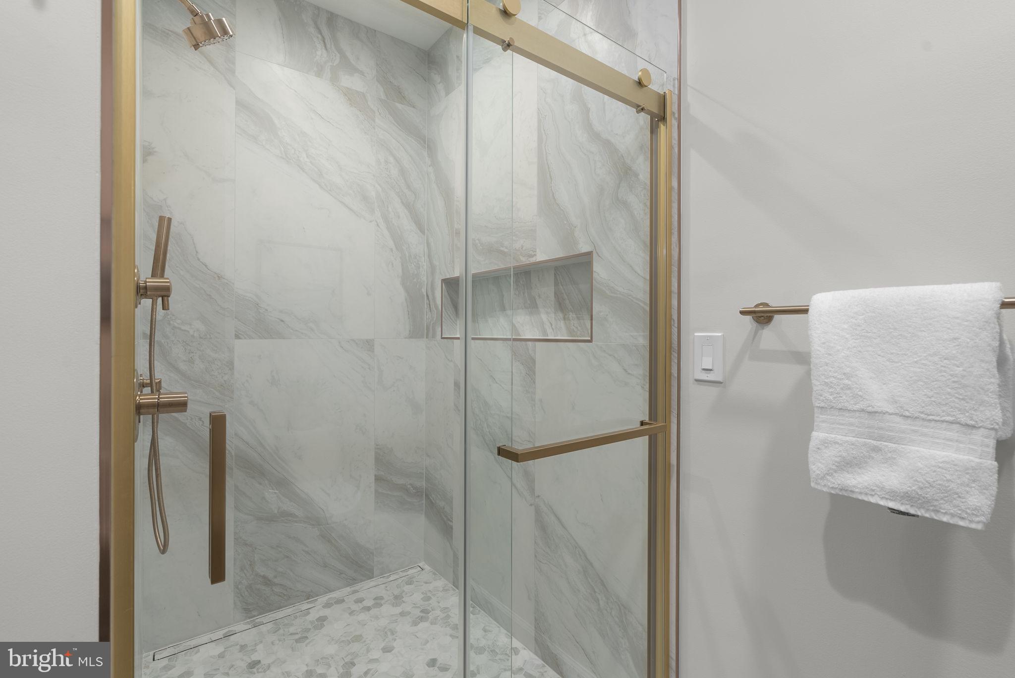 1100 South River Landing Road Edgewater, MD 21037 - Photo 22 of 53 Elegant shower with gold accents